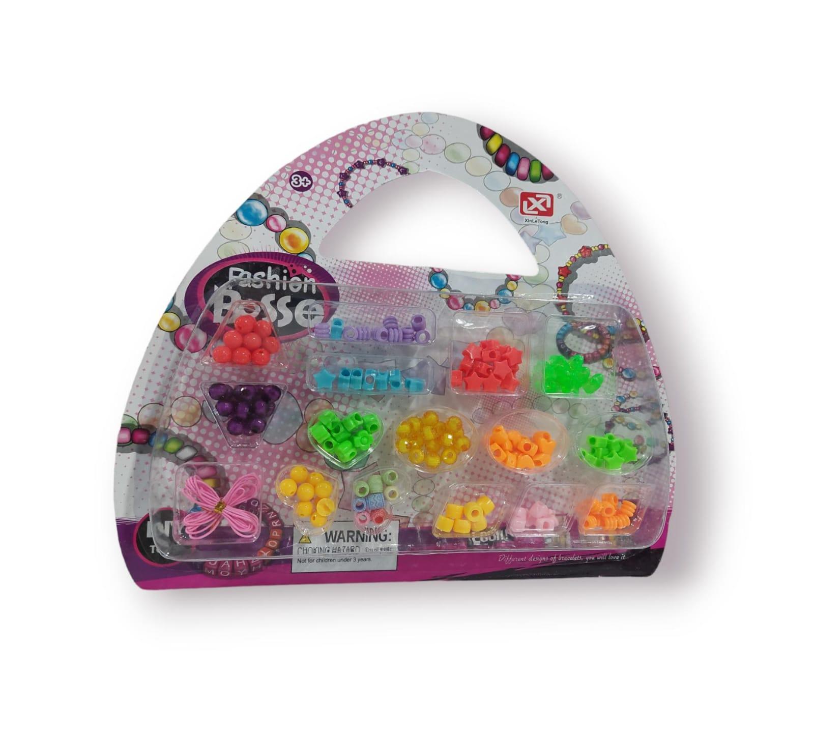 SET DE BIJOUTERIE PARA ARMAR COLLARES EN BLISTER CON FORMA DE CARTERITA
